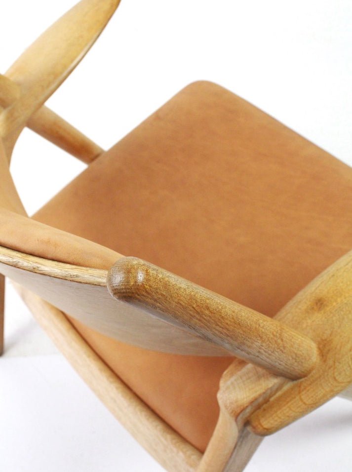 Sawbuck armchair CH28 by Hans J Wegner for Carl Hansen & Son - Collectors - Net.Work